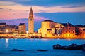 Town of Umag waterfront and coast evening view