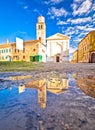 Town of Vizinada old cobbled square water reflection view