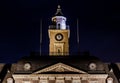 Townhall of Herne at night; close view of the tower clock