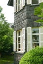 Townhouse in castle style with window and backyard