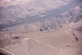 Towns along the Iran, Iraq border along the Shatt al-arab river with oil spills in foreground Royalty Free Stock Photo