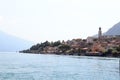 Townscape panorama of lakeside village Limone sul garda with boats and church at Lake Garda