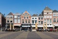 Townscape with people sitting on terraces of Delft, the Netherlands