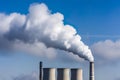 Toxic Emissions From Industrial Plants Against Blue Cloudy Backdrop - Generative AI