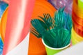 Toxic green plastic forks collected in a cup Royalty Free Stock Photo