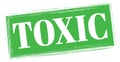 TOXIC text written on green stamp sign