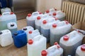 Toxic waste in jerry cans in the chemistry laboratory. Royalty Free Stock Photo
