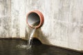 Toxic water running from sewers in dirty underground sewer for dredging drain tunnel cleaning. Royalty Free Stock Photo