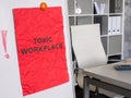 A Toxic workplace sign in the office. Royalty Free Stock Photo