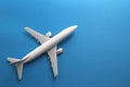 Toy airplane on blue background. Royalty Free Stock Photo