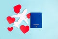 Toy airplane on blue table with red heart Royalty Free Stock Photo