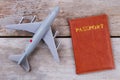 Toy airplane and passport flat lay. Royalty Free Stock Photo