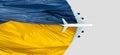 Toy airplane placed on the road painted the colors of the national flag of Ukraine