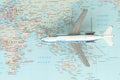 Toy airplane in a world map Royalty Free Stock Photo