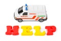 Toy ambulance car and word help Royalty Free Stock Photo
