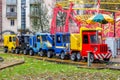 Toy attraction of the five machines for children in the fall on a rainy day