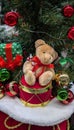 Toy bear with gifts under Christmas tree Royalty Free Stock Photo