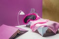 toy bed and torch lamp with real size sleeping mask and book Royalty Free Stock Photo
