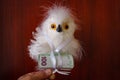 A Toy In Birds Form And A Few Real Euro Bills Tied To It