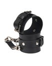 Toy black leather handcuffs isolated on the white background Royalty Free Stock Photo