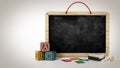 Toy blackboard, education cubes, two chalks and eraser. 3D illustration