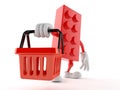 Toy block character holding empty shopping basket Royalty Free Stock Photo