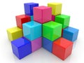 Toy blocks of different colors in an abstract pyramid on white Royalty Free Stock Photo