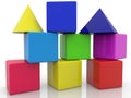 Toy blocks of different colors and shapes on a white Royalty Free Stock Photo