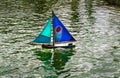 Toy Boat on Pond