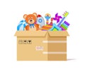 Toy box. Donate toys, charity kids support. Volunteer donations for poor children in cardboard parcel. Endowing child