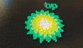 Toy bricks compose logo of BP. Editorial conceptual 3d rendering