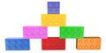 Toy bricks of different colors are stacked on top of each other Royalty Free Stock Photo
