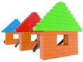 Toy bricks houses in row on white
