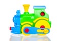 Toy bright colorful train constructor for assembly with bolts, isolated on a white background Royalty Free Stock Photo