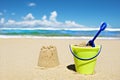 Toy bucket and shovel on the beach Royalty Free Stock Photo