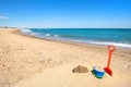 Toy bucket and shovel at the beach Royalty Free Stock Photo
