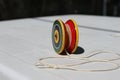 A toy called `Yo-yo` is on a table