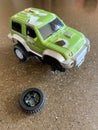 Toy car with a broken wheel Royalty Free Stock Photo