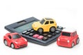 Toy car and calculator. Concept for finance and insurance