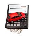 Toy car and calculator over white Royalty Free Stock Photo