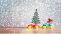 Toy Car with Christmas tree and gift box. Christmas landscape with gifts and snow. Merry christmas and happy new year greeting car Royalty Free Stock Photo