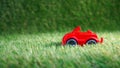 Toy car on the green artificial grass Royalty Free Stock Photo