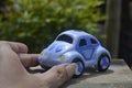toy car made of clay placed on a board