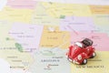 Toy car on map Royalty Free Stock Photo
