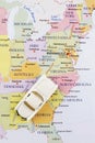 Toy car on map Royalty Free Stock Photo