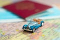 Car, medical mask and passport on the Europe map Royalty Free Stock Photo