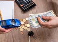 Toy car, money, calculator, notebook and pen Royalty Free Stock Photo