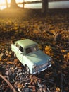 Toy car on the road nature background ,vintage filter Royalty Free Stock Photo