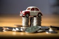 Toy car sitting on top of stacks of coins. Generative AI Royalty Free Stock Photo