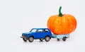 A toy car with a trailer simulates food delivery Royalty Free Stock Photo